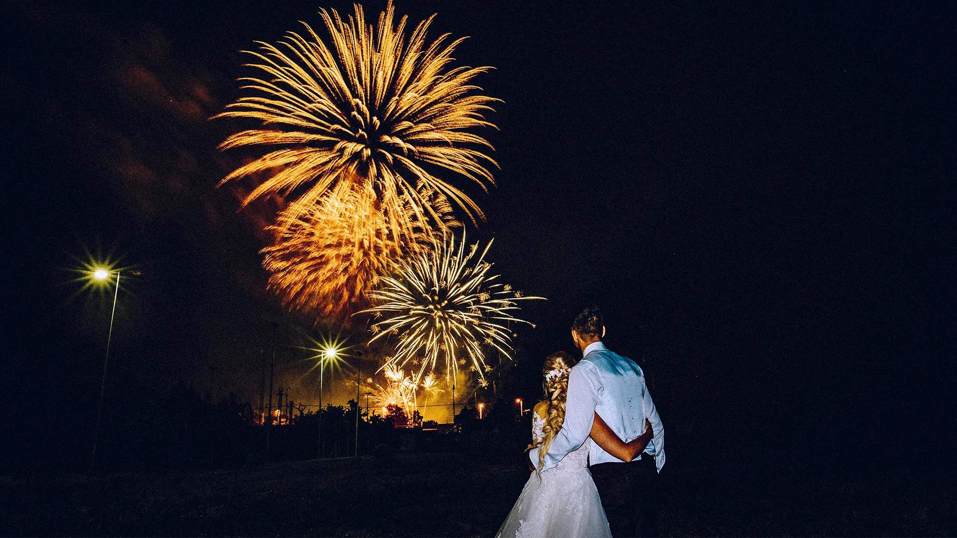 Star-themed wedding at Prested Hall Essex with fairy lights and celestial décor under the night sky