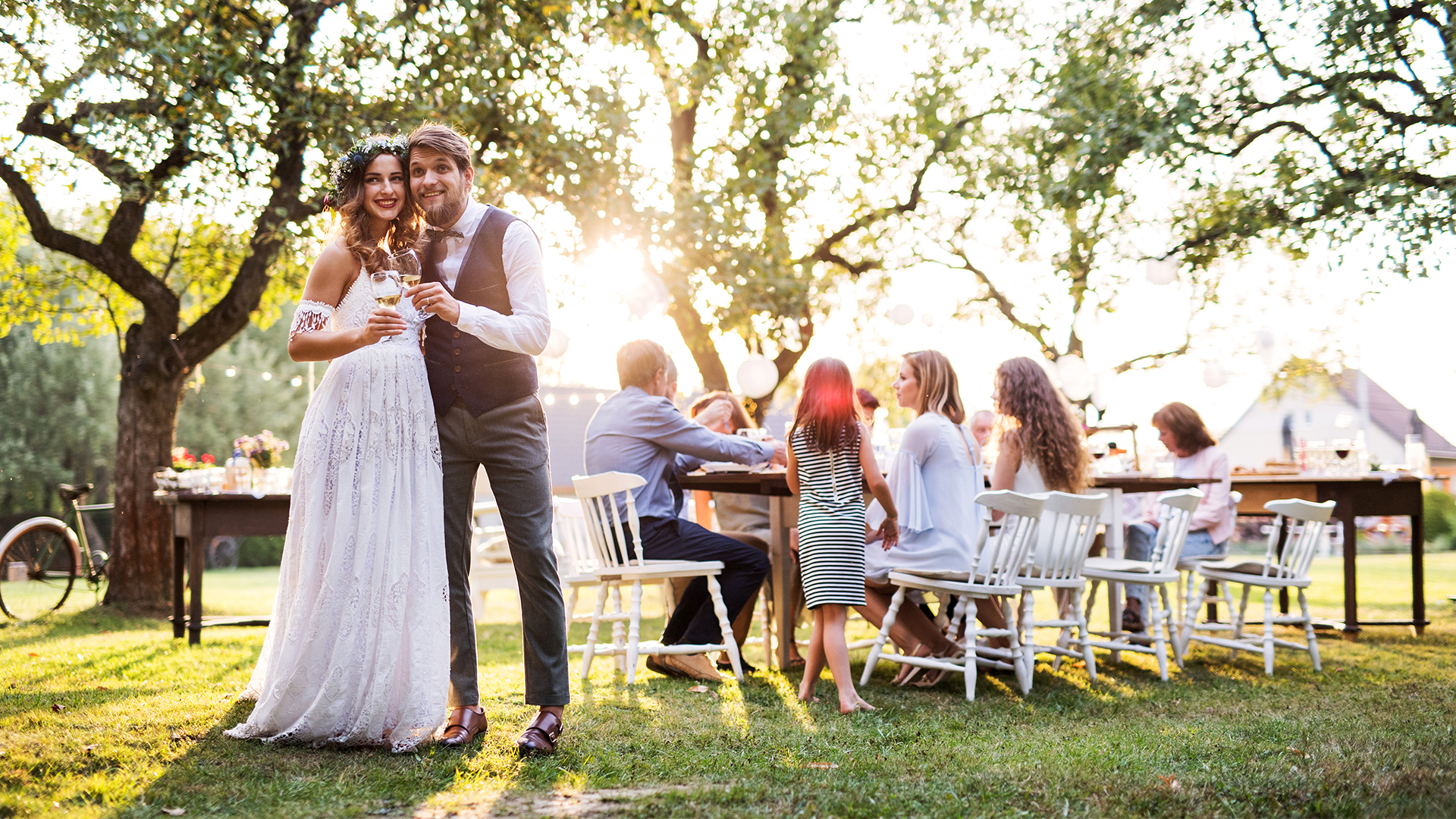 Guests enjoying a sunny weekend celebration on the lawns of Prested Hall, a premier Multi Day Wedding Venue Essex.